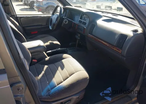 1997 Jeep Grand Cherokee Laredo/Tsi from USA, damaged, VIN 1J4GZ58S2VC633512